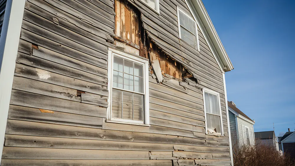 Damaged siding that needs to be replaced