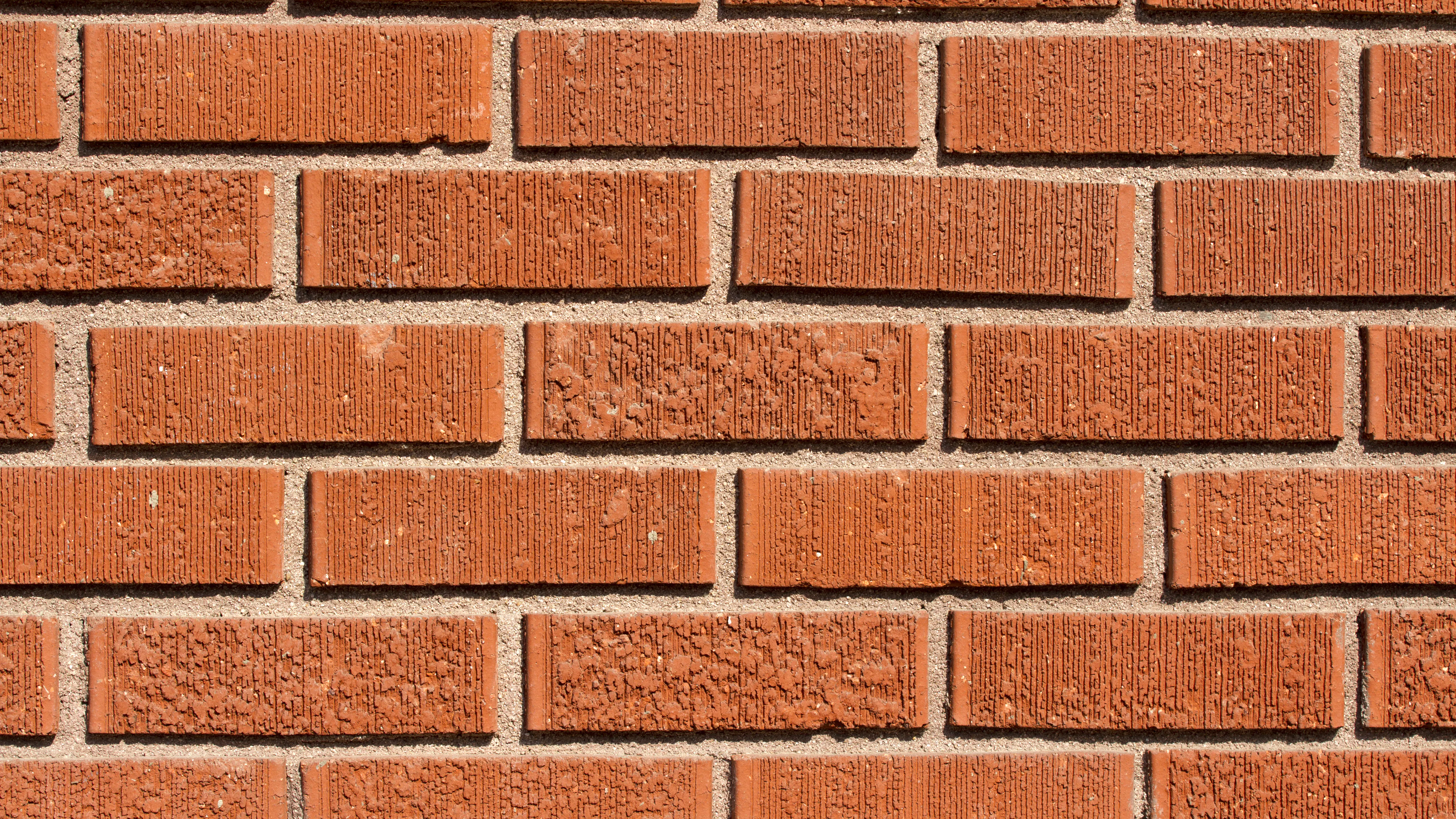 How Much Does It Cost To Replace Siding? The Cost Of 8 Popular Siding Styles 18 A close up of brick siding