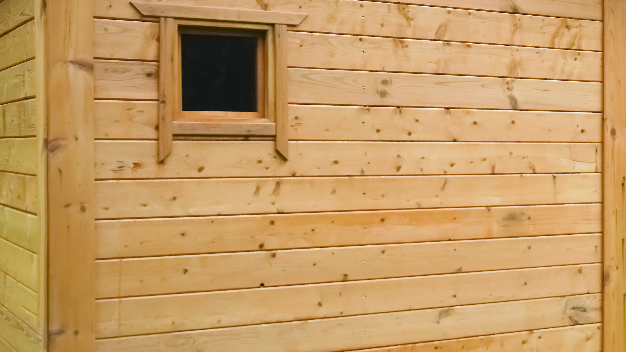 How Much Does It Cost To Replace Siding? The Cost Of 8 Popular Siding Styles 13 A close up of wood siding
